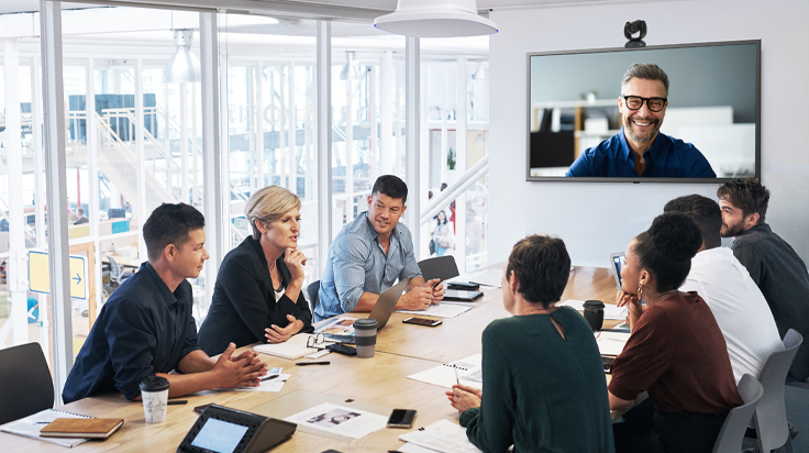 A group of business people working in a video conference